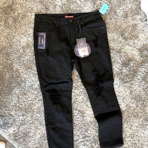 Brand new  ripped black jeans